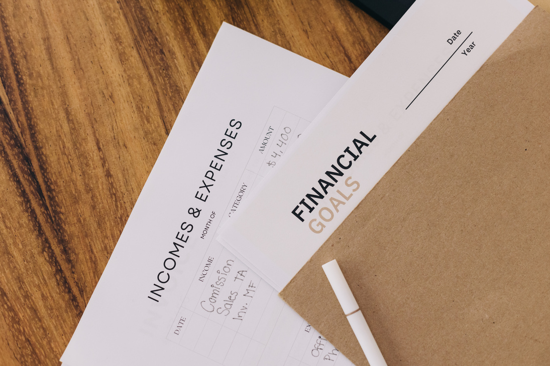 Financial Statements and Invoices on Table